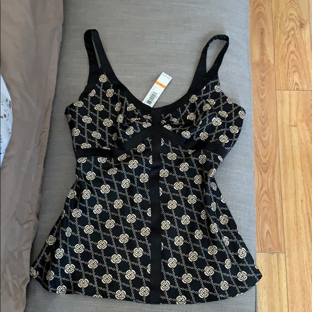 Brand new. Never worn. 100% silk material
